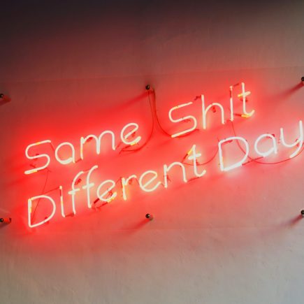 Text: Same shit different day
